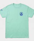Mint green Alchemy Harvest Coffee cotton t-shirt featuring a front logo print and a distressed back graphic of a cat carrying four cold brew cans.